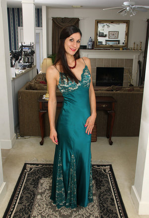 18 year old female Doris G slips off her underwear to pose naked on her bed